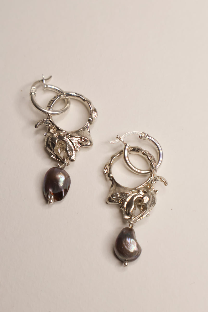 Silver earrings with pearl detail