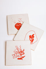 Ceramic tiles with red illustrations