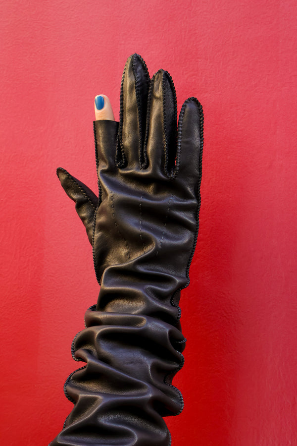 Long leather glove with exposed index finger