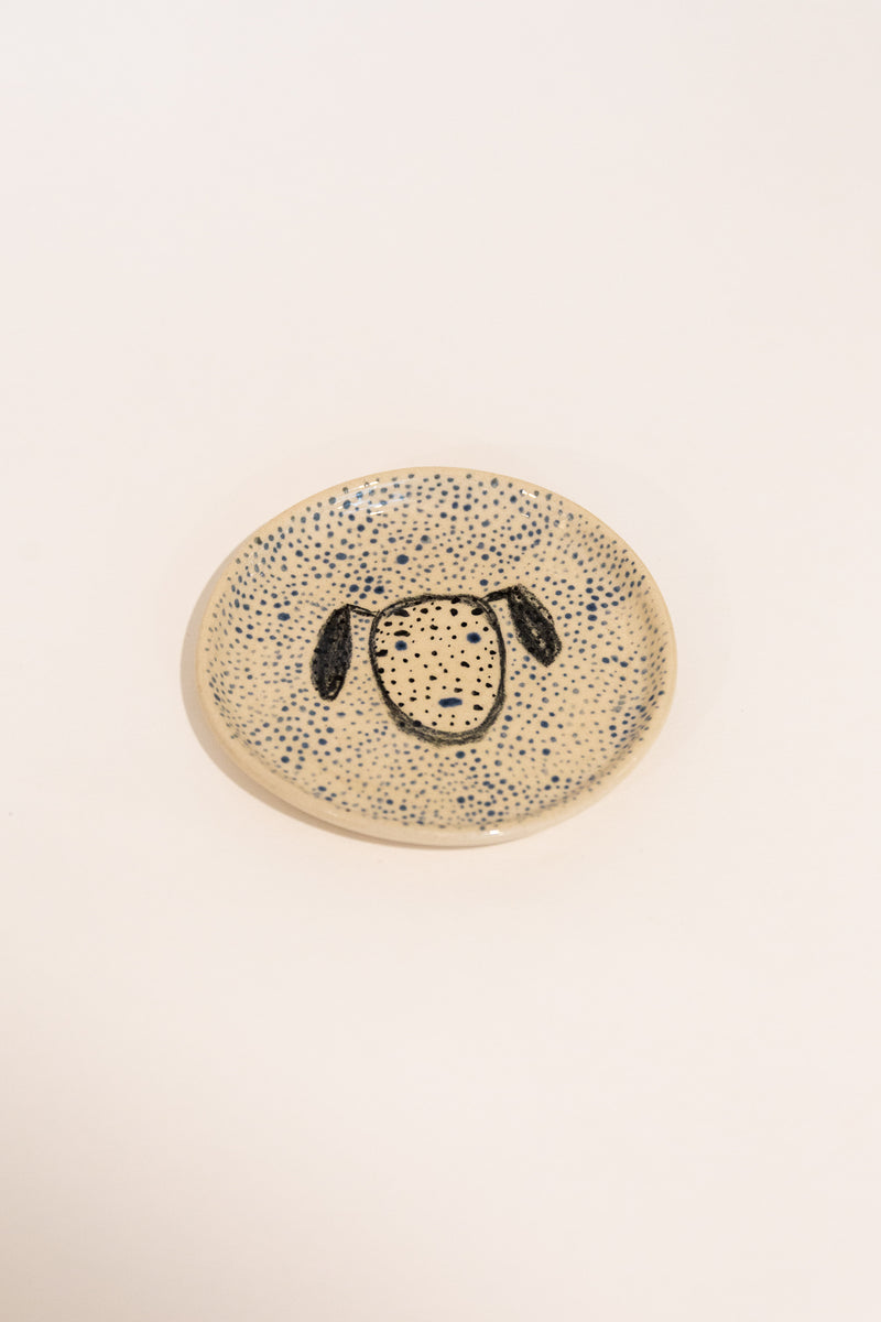 Ceramic plate with dog illustration
