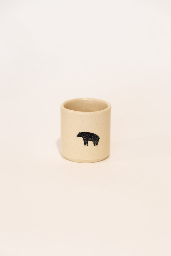 Ceramic cup with bear illustration