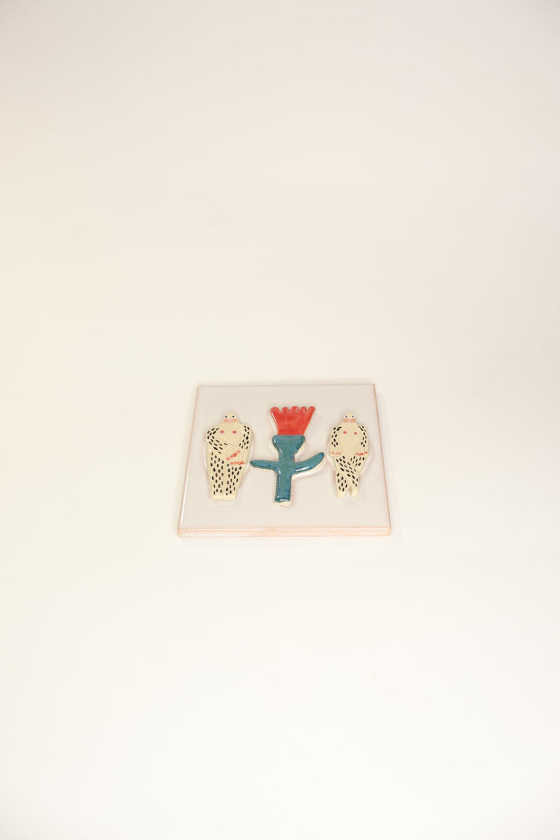 Tile with colorful characters wolkje